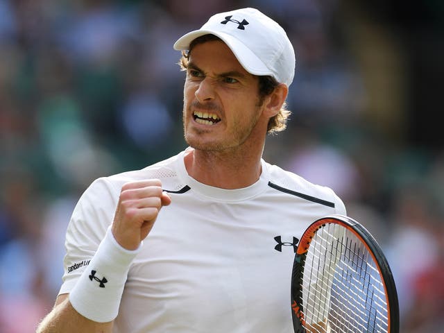 Andy Murray celebrates clinching the first set against Jo-Wilfried Tsonga