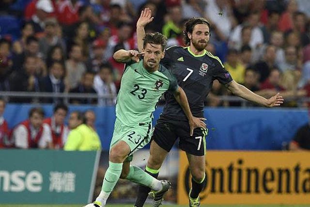 Adrien Silva takes on Joe Allen as Portugal overcame Wales to make the Euro 2016 final (Getty)