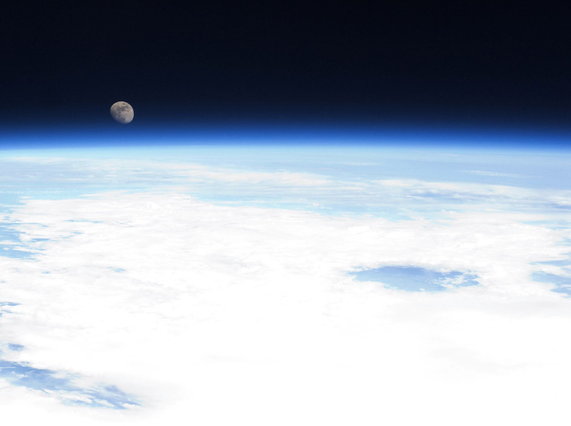 The Earth's horizon and the moon seen from the International Space Station