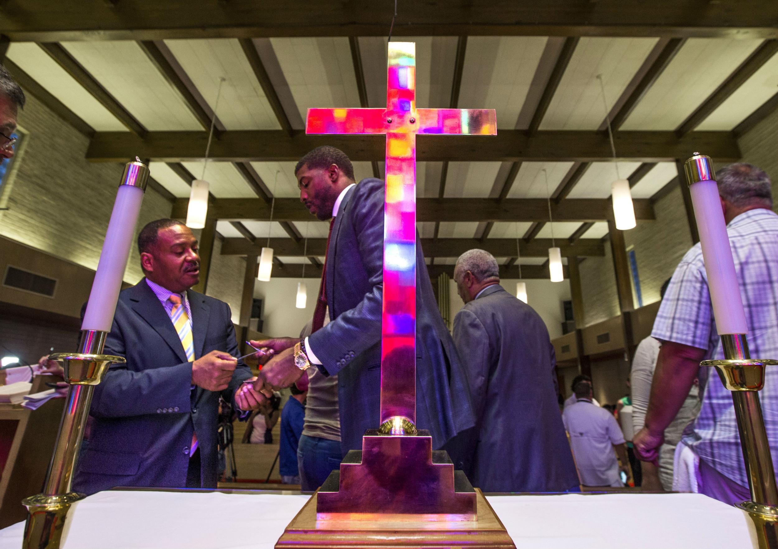 Churchgoers mourn the death of Alton Sterling in Baton Rouge, Louisiana