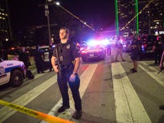 Dallas police shooting: Suspect in standoff at garage tells officers 'more will die'
