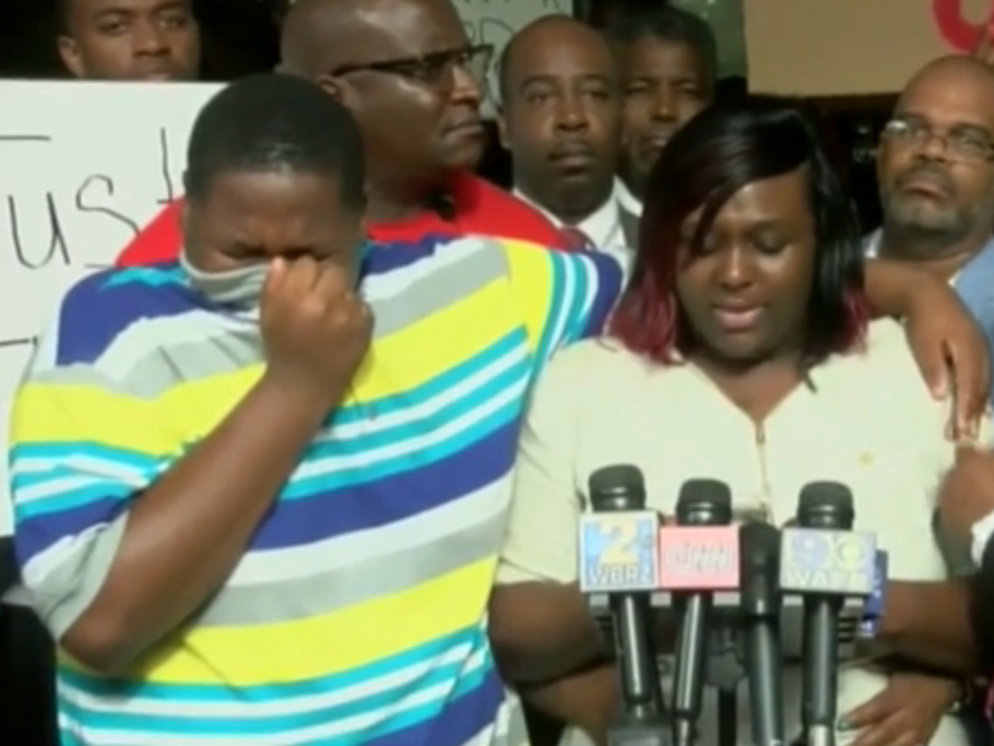 Cameron Sterling appears alongside his mother Quinyetta McMillon at a news conference following the death of Alton Sterling