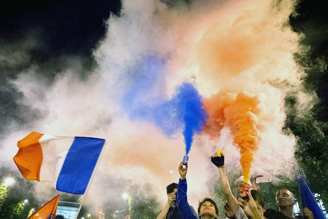 French football fans celebrate following Thursday’s semi-final win against Germany