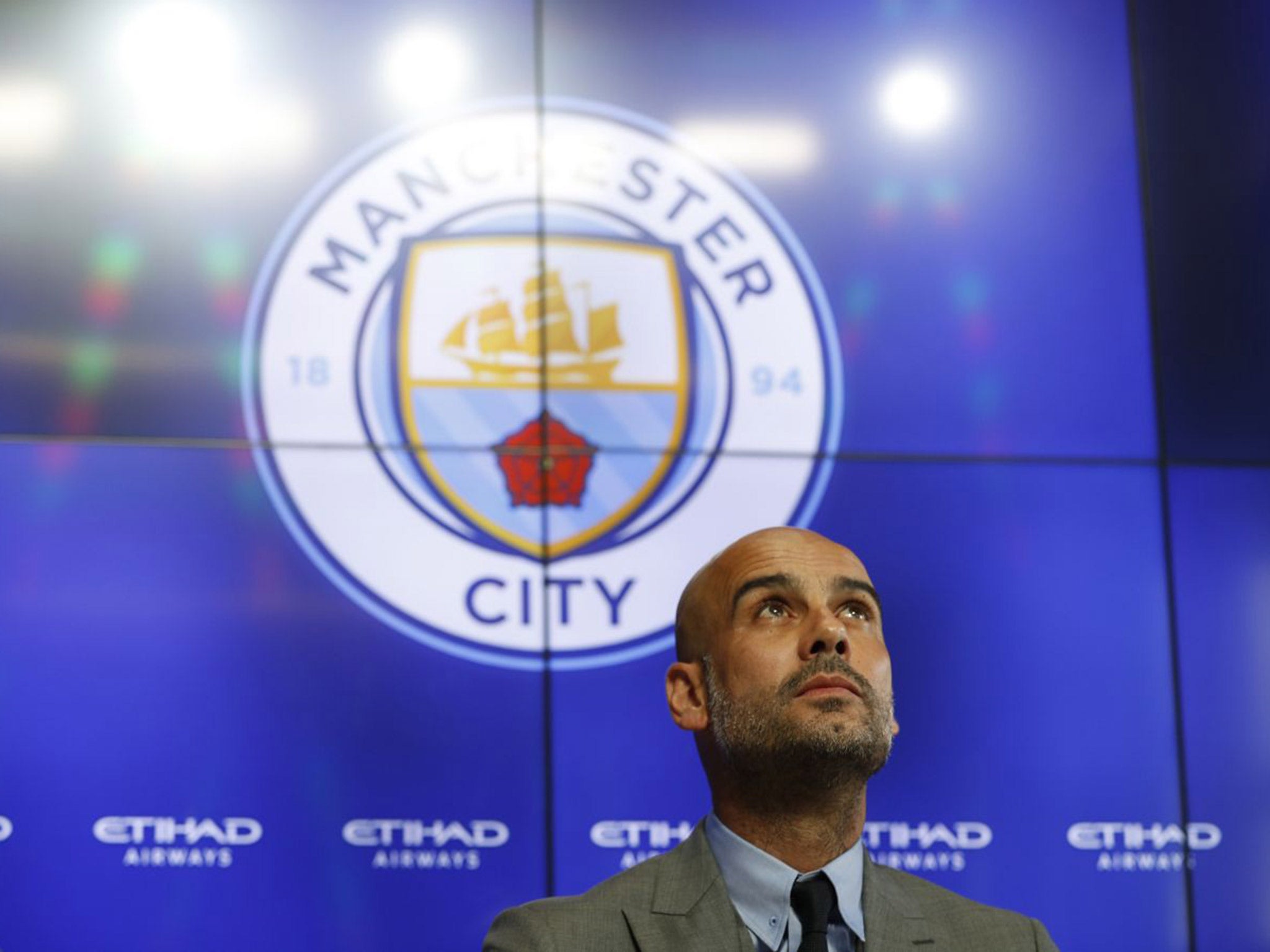 Pep Guardiola speaks at his first press conference as Manchester City manager