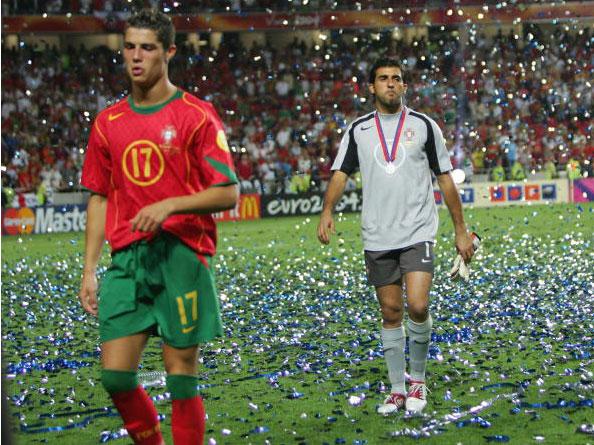 Cristiano Ronaldo and Ricardo trudge from the field amid the tickertape celebrating Greece's Euro 2004 final success (Getty)