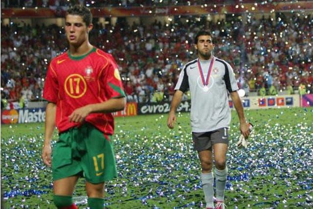 Cristiano Ronaldo and Ricardo trudge from the field amid the tickertape celebrating Greece's Euro 2004 final success (Getty)