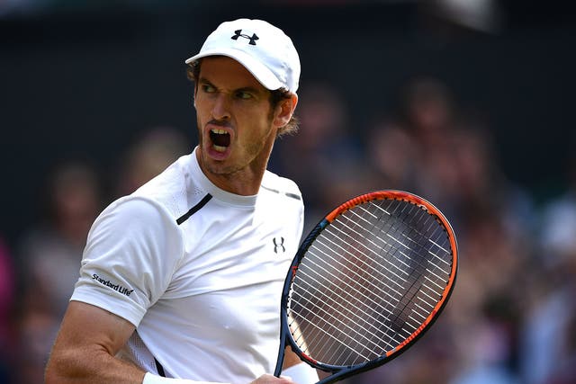 Andy Murray celebrates taking the first set against Tomas Berdych