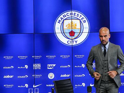 Pep Guariola put on an impressive showing as he met the press for the first time as Manchester City manager (Getty)