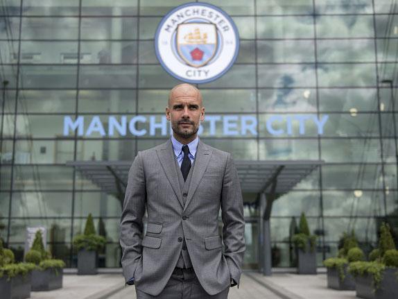 Pep Guardiola said he was looking forward to discovering the unique demands of the Premier League (Getty)