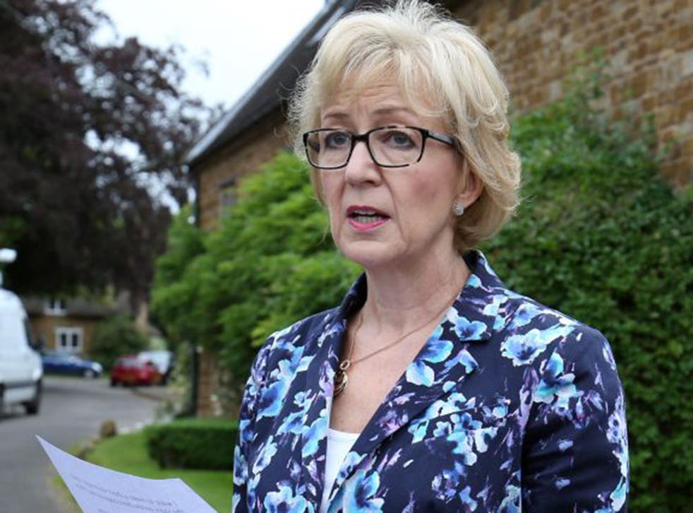 Andrea Leadsom reads a statement outside her home in Northamptonshire