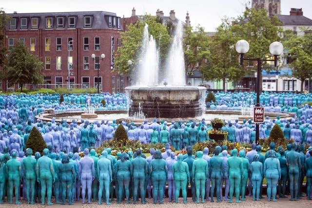 People take part in an installation entitled Sea of Hull, by artist Spencer Tunick