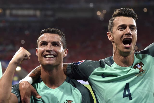 Ronaldo celebrates Portugal's semi-final victory with teammate Jose Fonte