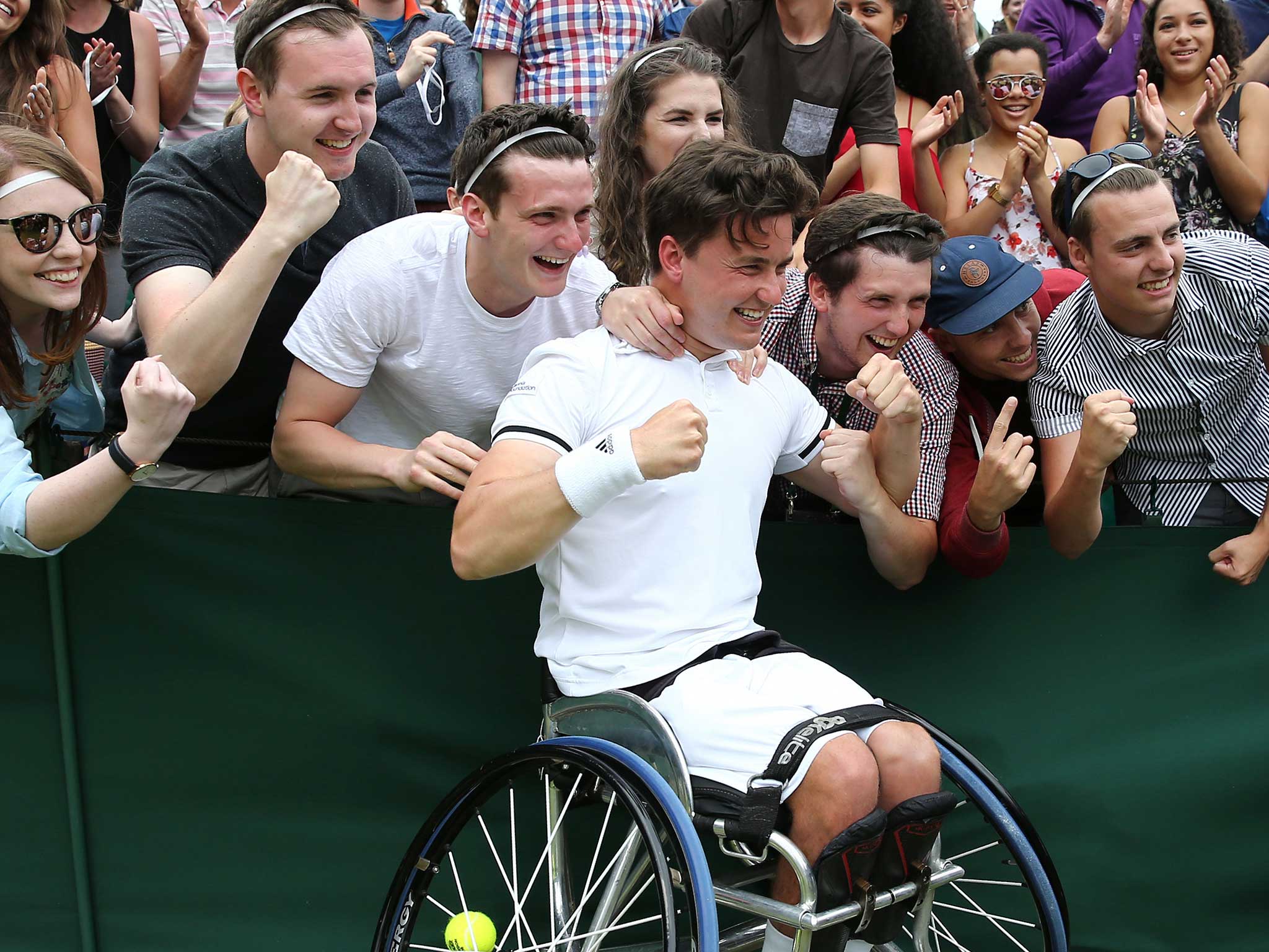 Gordon Reid celebrates with the Wimbledon crowd