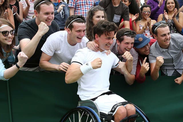 Gordon Reid celebrates with the Wimbledon crowd