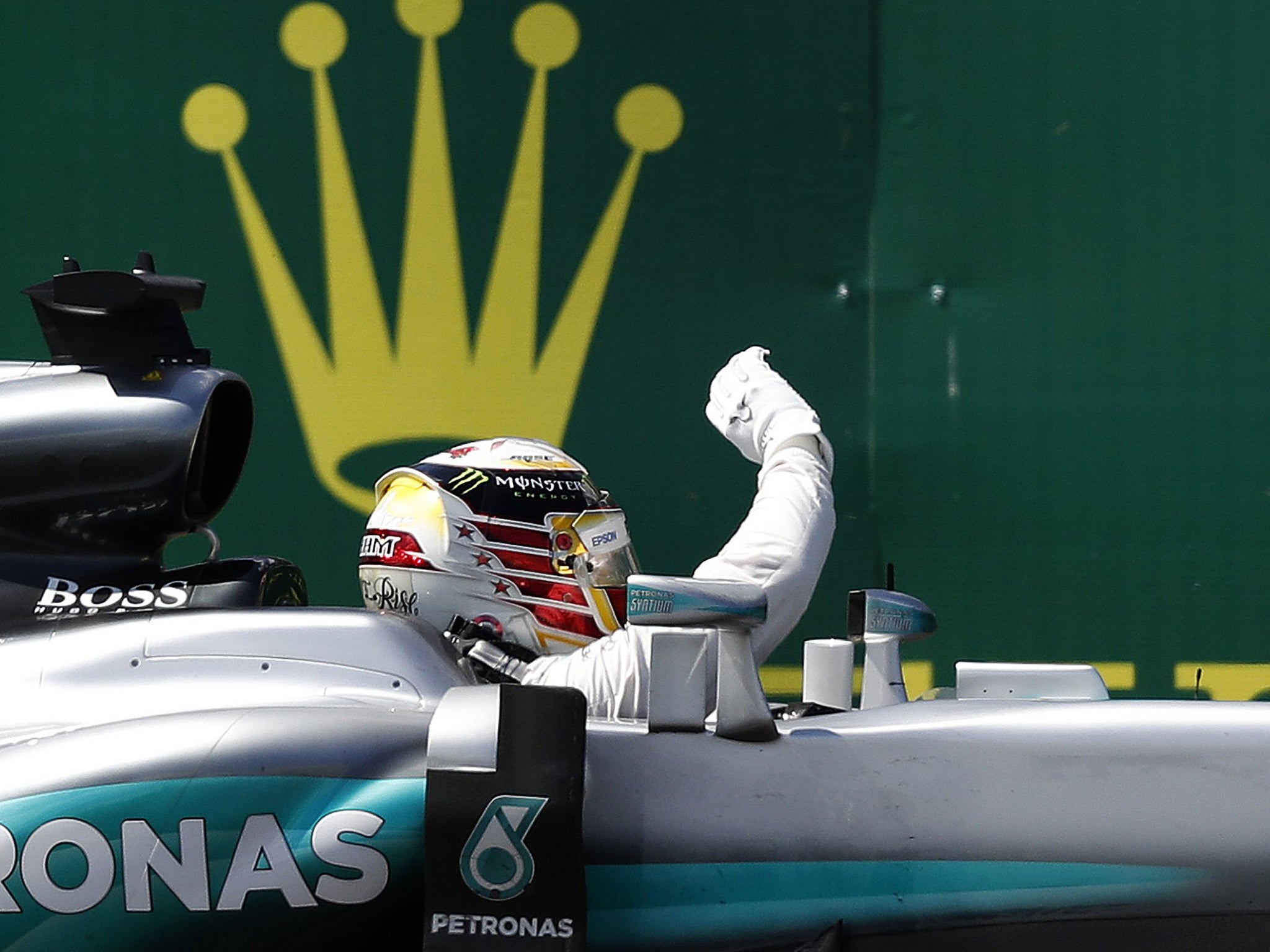 Hamilton waves to the fans after winning the British Grand Prix