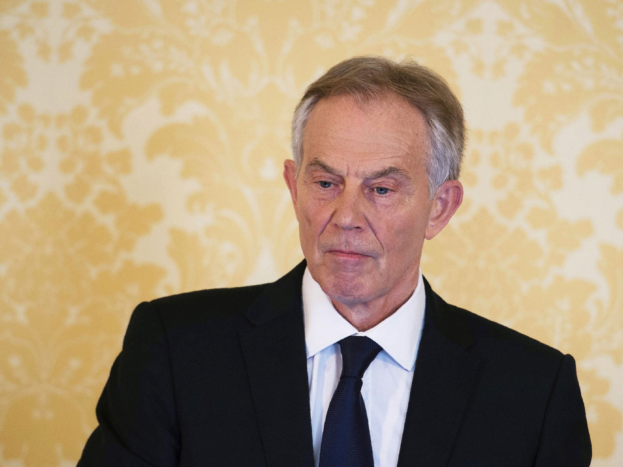 Tony Blair, pictured addressing troops in Basra in 2003, faces a parliamentary motion over his ‘deceit’ in the run-up to the Iraq War