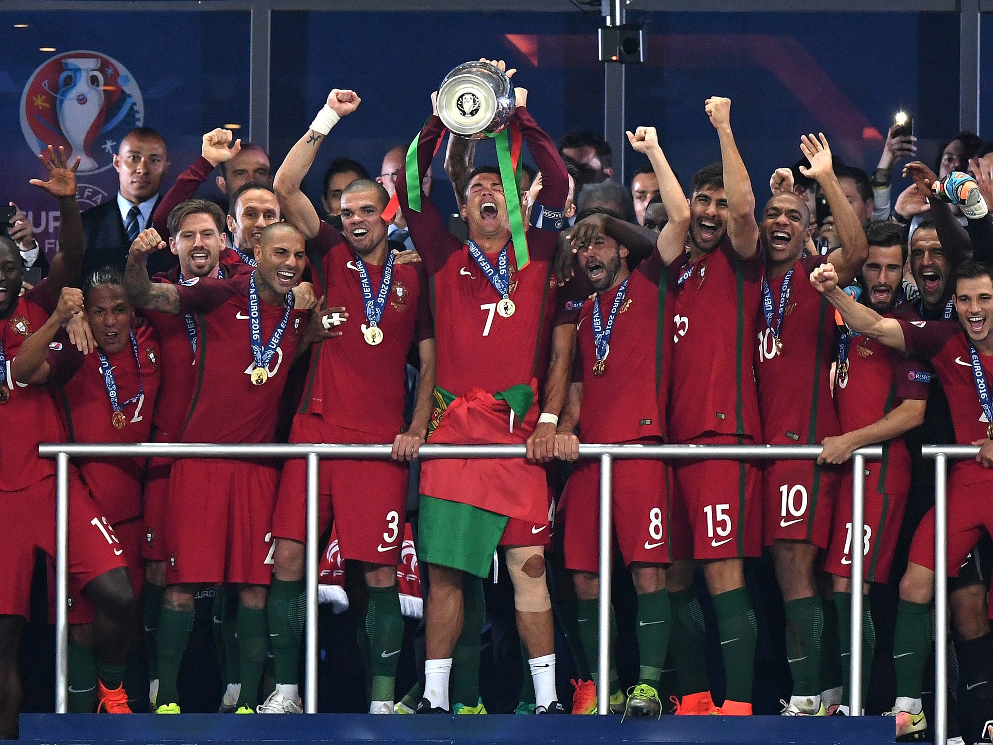 Portugal players celebrate winning the European Championship with a 1-0 victory over France