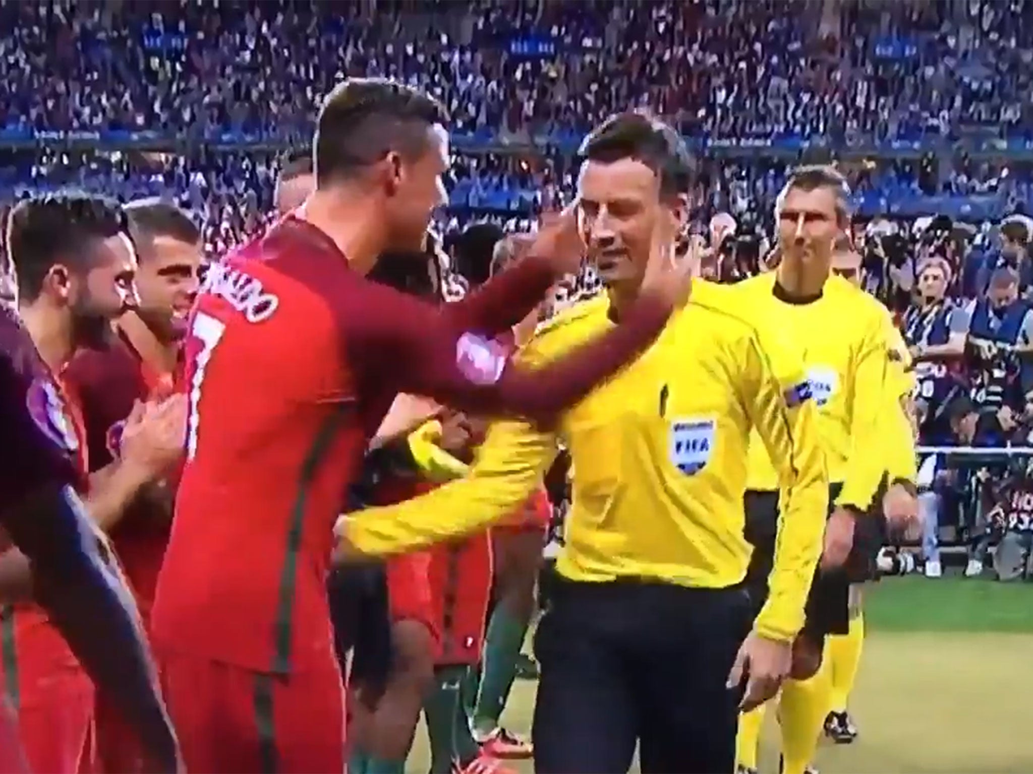 Cristiano Ronaldo grabs Mark Clattenburg in delight