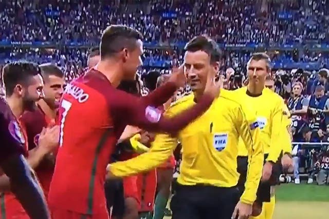 Cristiano Ronaldo grabs Mark Clattenburg in delight