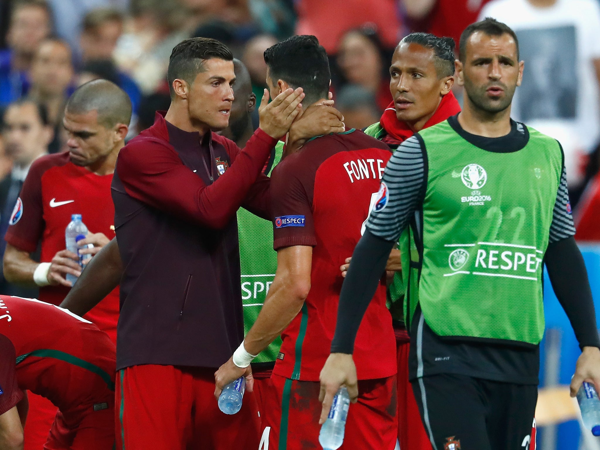 Ronaldo shares some words of encouragement with Jose Fonte at half-time in extra-time