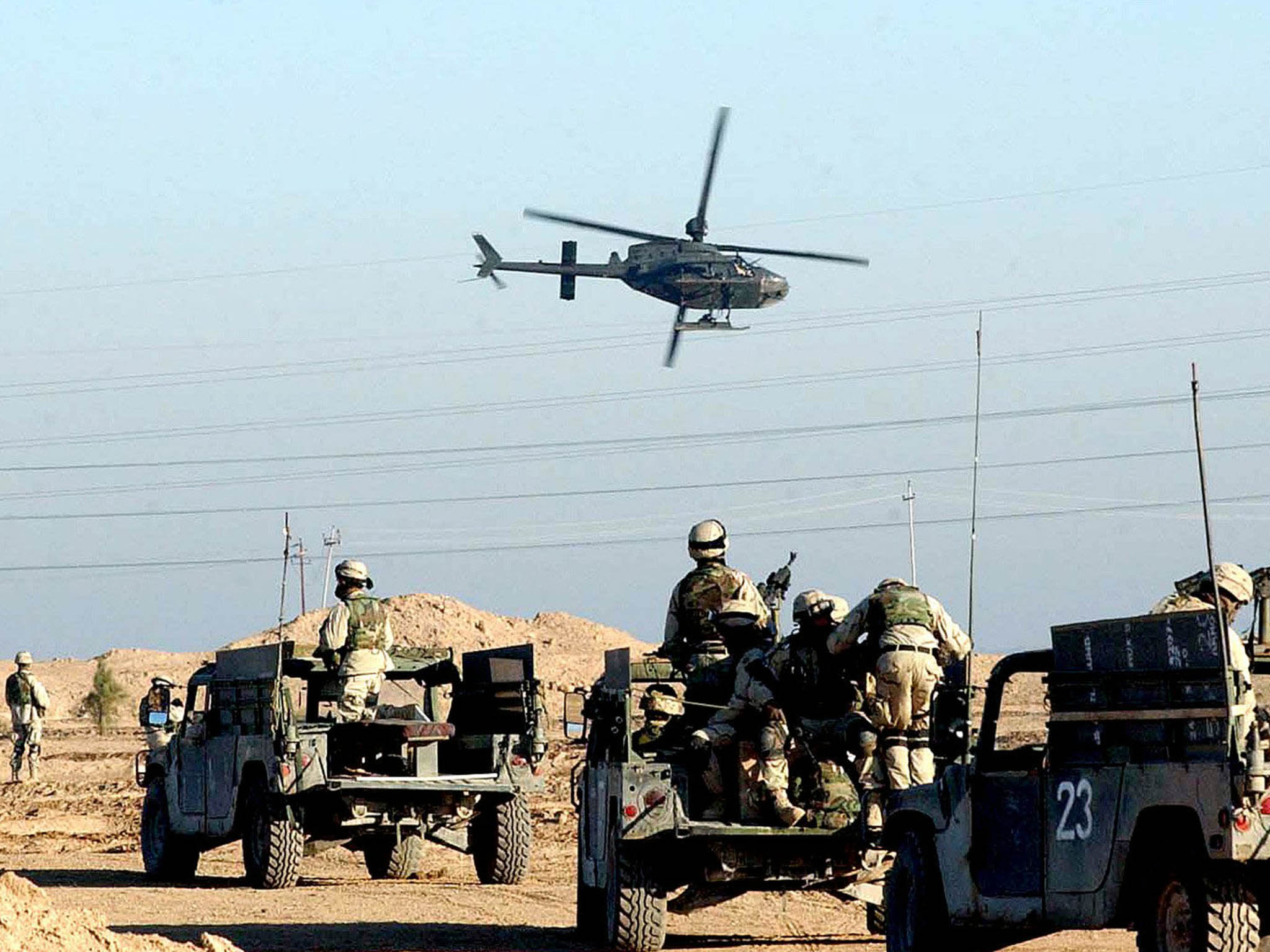 Members of Bravo company 1/505 Parachute Infantry Regiment 82nd Airborne Division conducting a mounted patrol in Al Fallujah, 21 Dec 2003