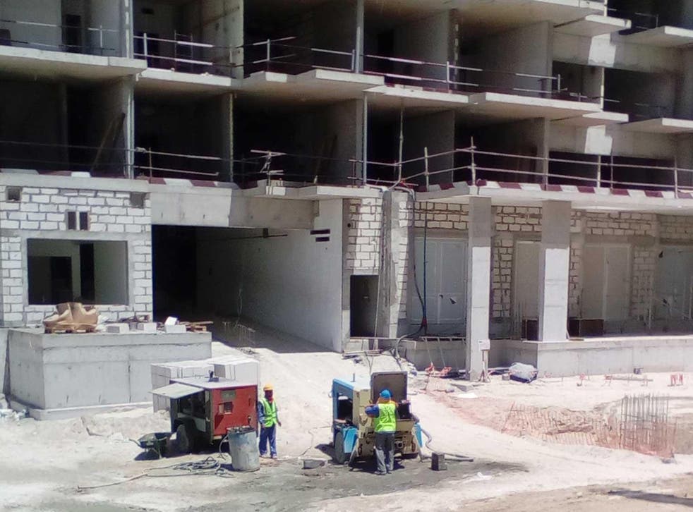 Workers on the Ansam residential project on the man-made Yas Island in Abu Dhabi