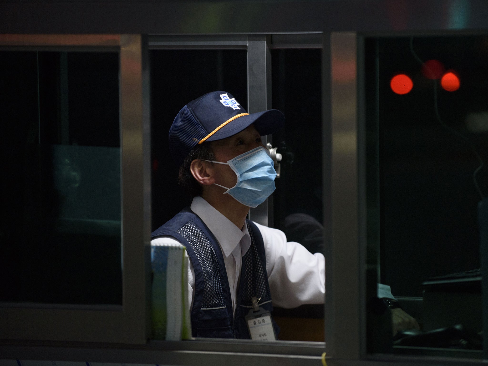 A security guard at Good Gang-an Hospital in Busan, South Korea during the 2015 Mers outbreak