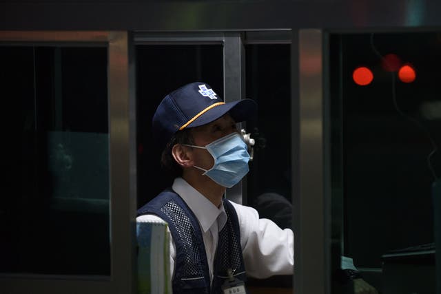 A security guard at Good Gang-an Hospital in Busan, South Korea during the 2015 Mers outbreak