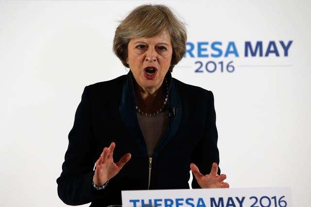 Theresa May has suggested EU migrants living in the UK cannot have a right to remain guaranteed