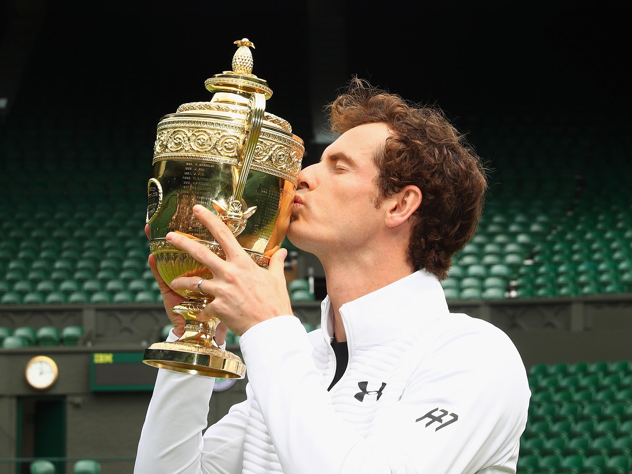 Murray with the Gentlemen's Singles Trophy at Centre Court on Monday