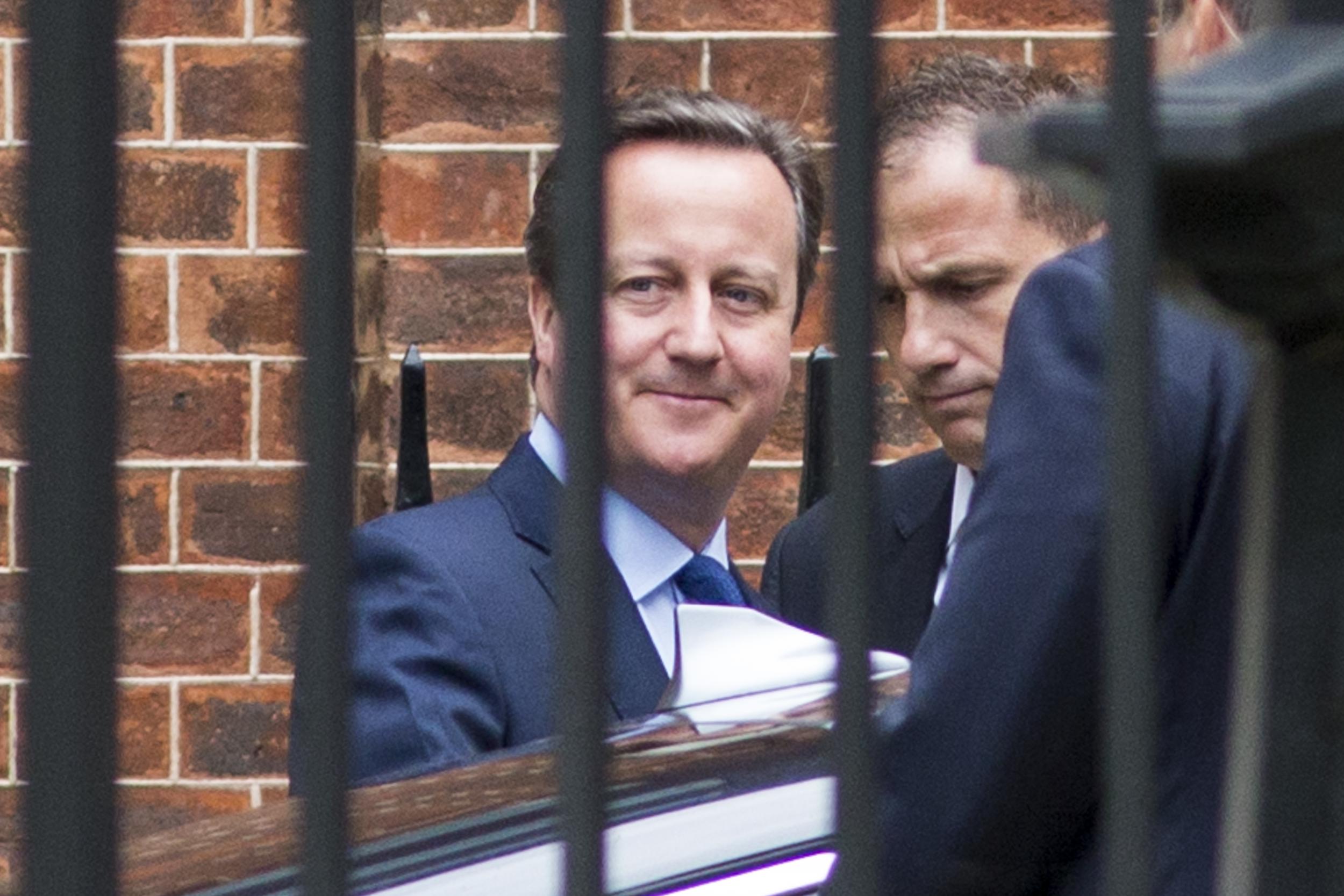 David Cameron leaves Downing Street after his final Cabinet meeting as PM