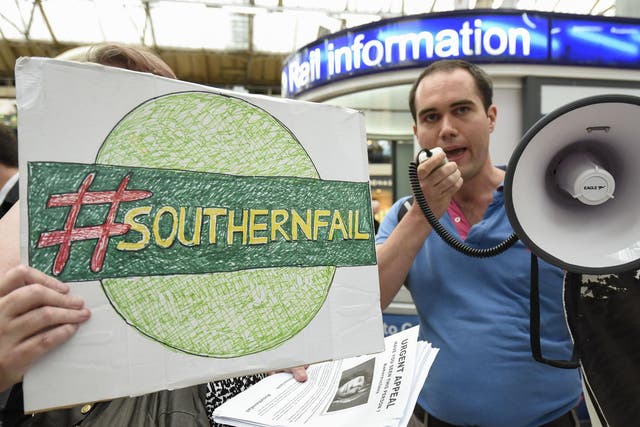 Passengers stage a 'fare strike' and protest at Victoria Station in central London in response to Southern Railway's delays