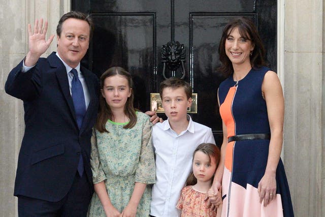 David Cameron waves outside No 10 with his family as he leaves for the final time