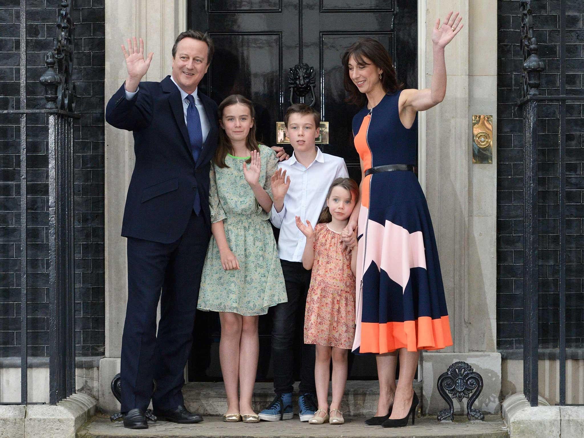 David Cameron waves outside 10 Downing Street with his family (L-R) his daughter Nancy Gwen, son Arthur Elwen, daughter Florence Rose Endellion and his wife Samantha, before going to Buckingham Palace to tender his resignation to Queen Elizabeth II