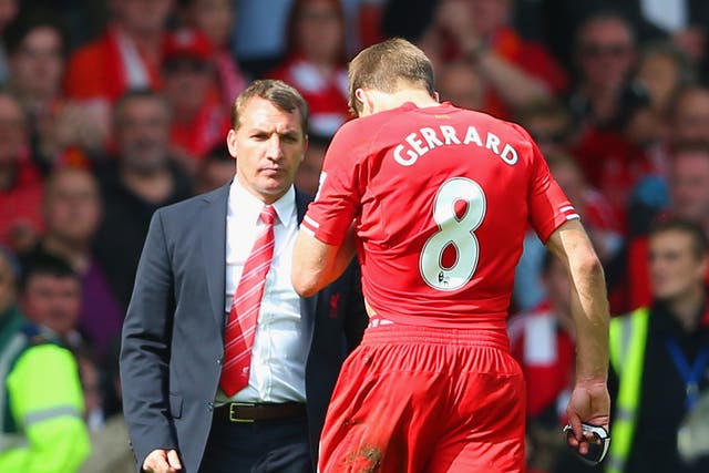 <p>Brendan Rodgers goes to commiserate with Steven Gerrard after defeat to Chelsea in 2014</p>