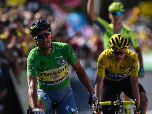 Peter Sagan crosses the finish line on Wednesday's eleventh stage, with Chris Froome in close attendance (Getty)