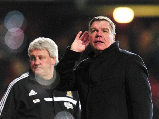 Sam Allardyce mocks criticism from West Ham supporters after beating Steve Bruce's Hull in March 2014 (Getty)