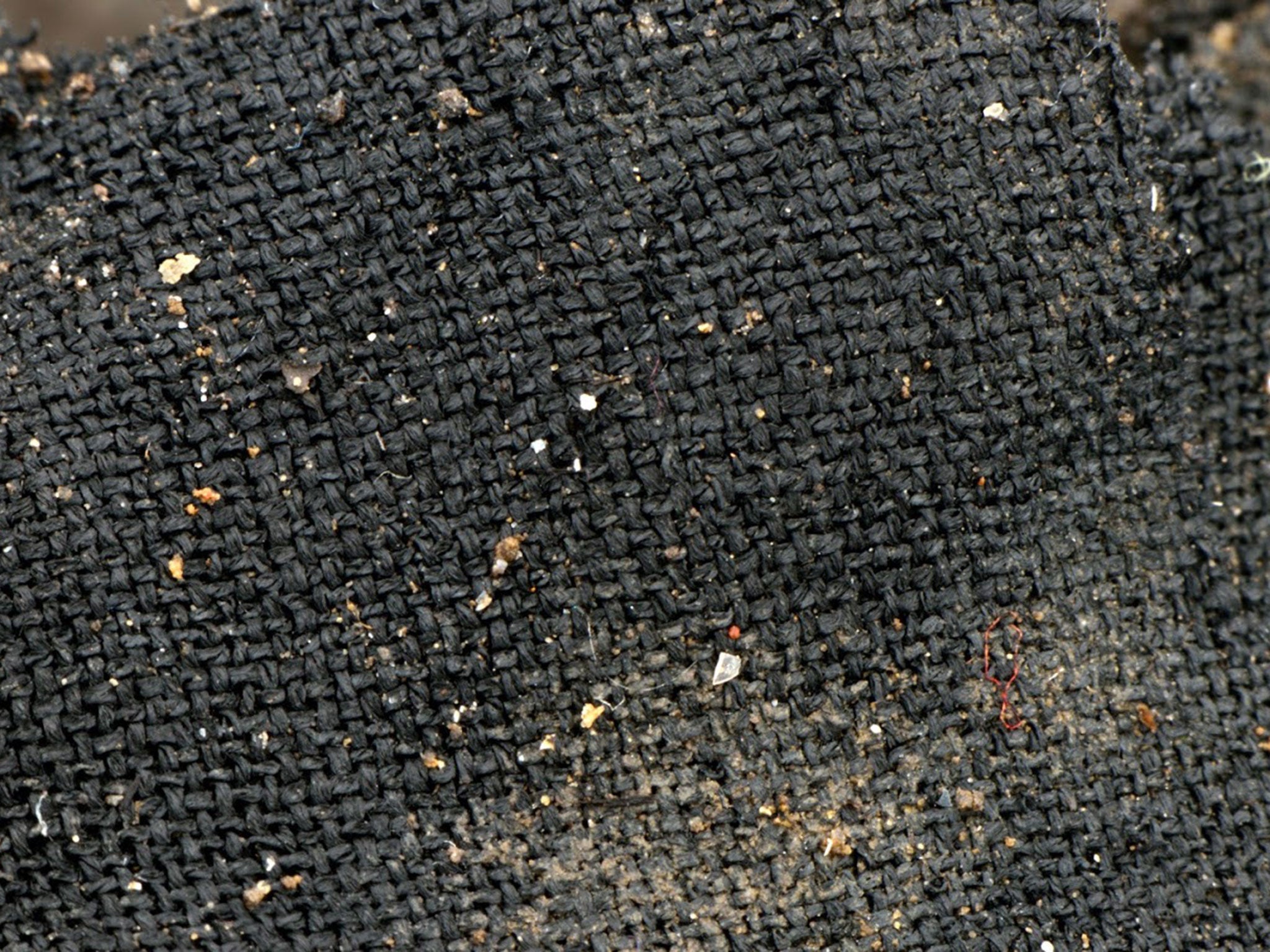 Close-up of finely wooven textile made from plant fibres. The roundhouses contained Europe's finest collection of fabrics and fibres