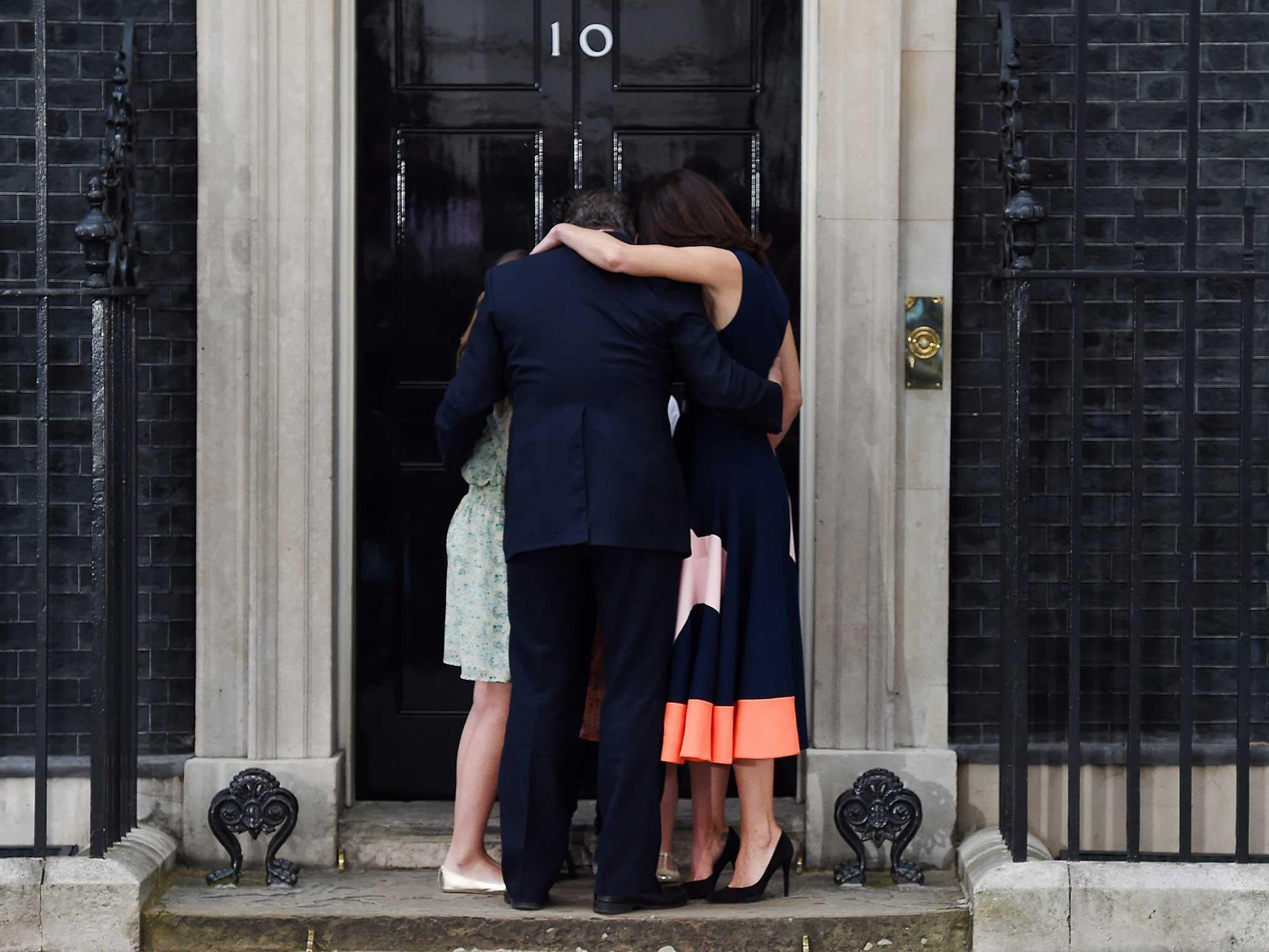 David Cameron embraces his family on departure from No 10 for the last time