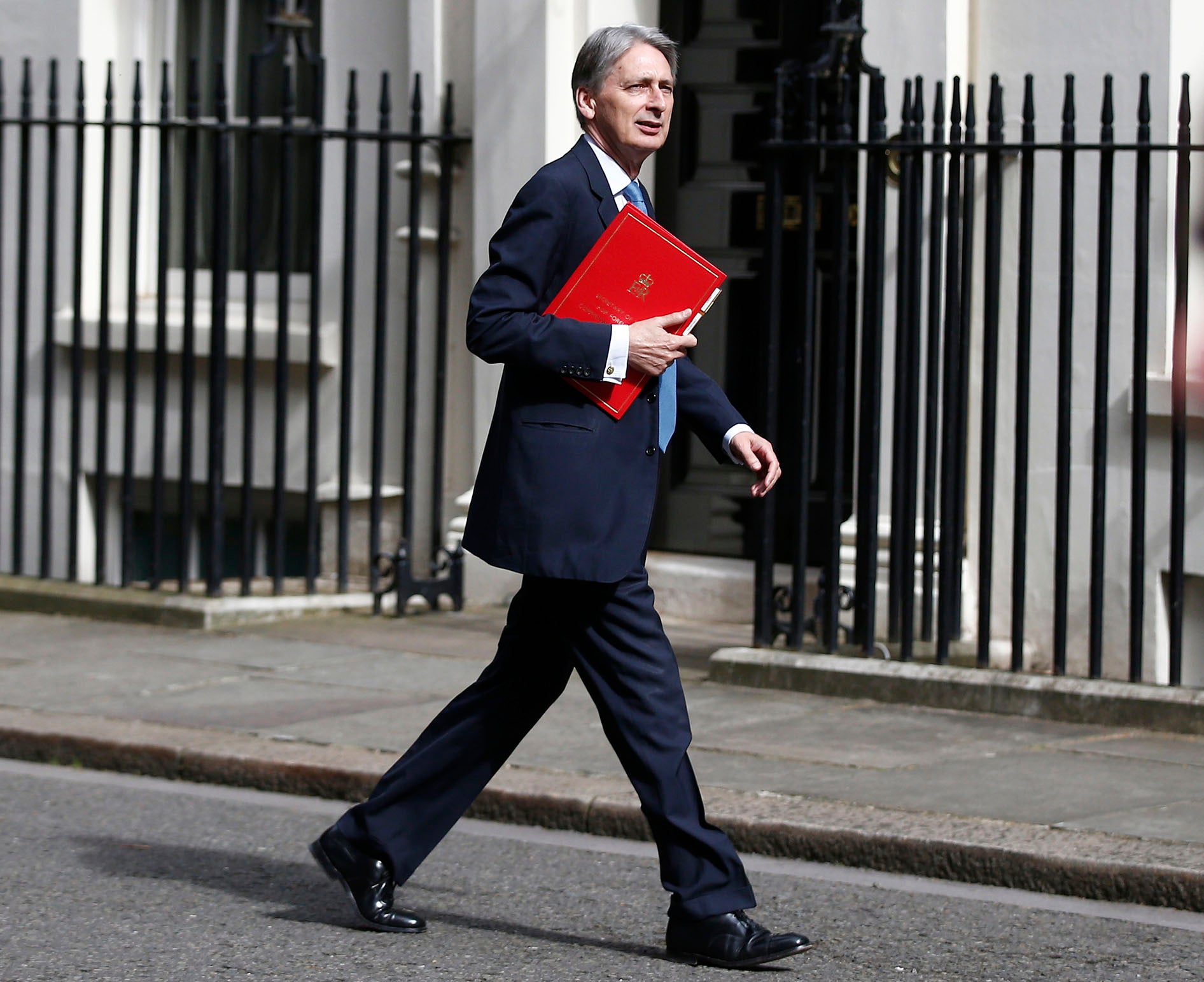 Phillip Hammond walks into Downing Street on his first day as Chancellor
