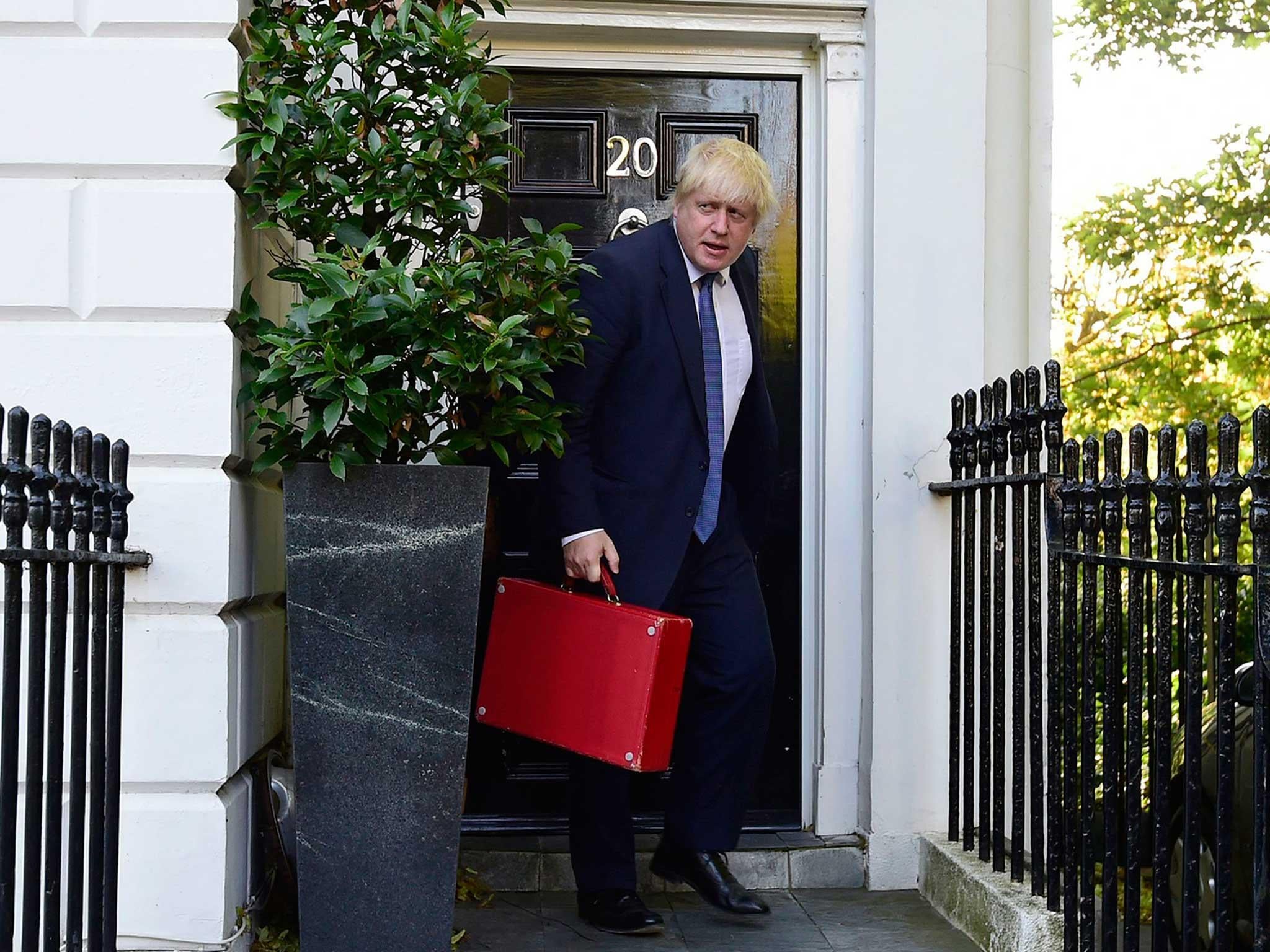Newly appointed British Foreign Secretary Boris Johnson leaves his home in north London