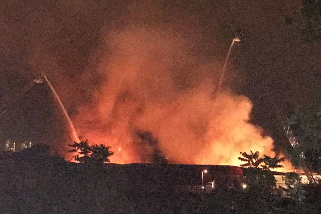 Around 100 firefighters were called to tackle the fire