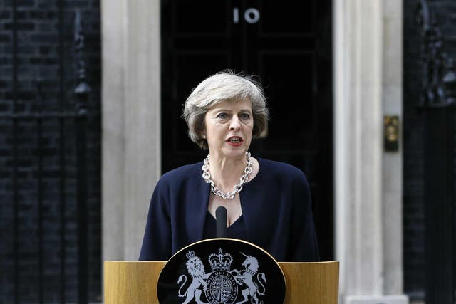 New British Prime Minister Theresa May speaks to the media outside her official residence 10 Downing Street in London