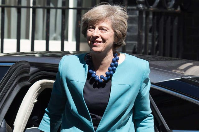 British Prime Minister Theresa May arrives in Downing Street