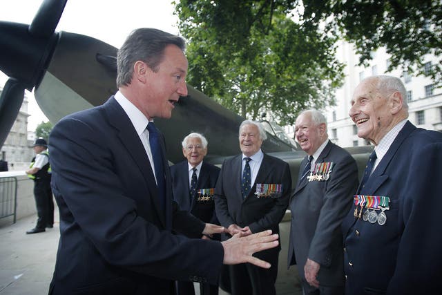 David Cameron meets war veterans during his time as prime minister of Britain