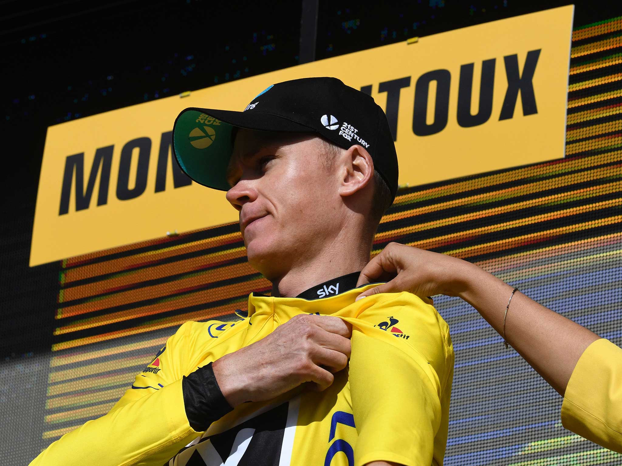 Chris Froome retains the yellow jersey despite odd circumstances