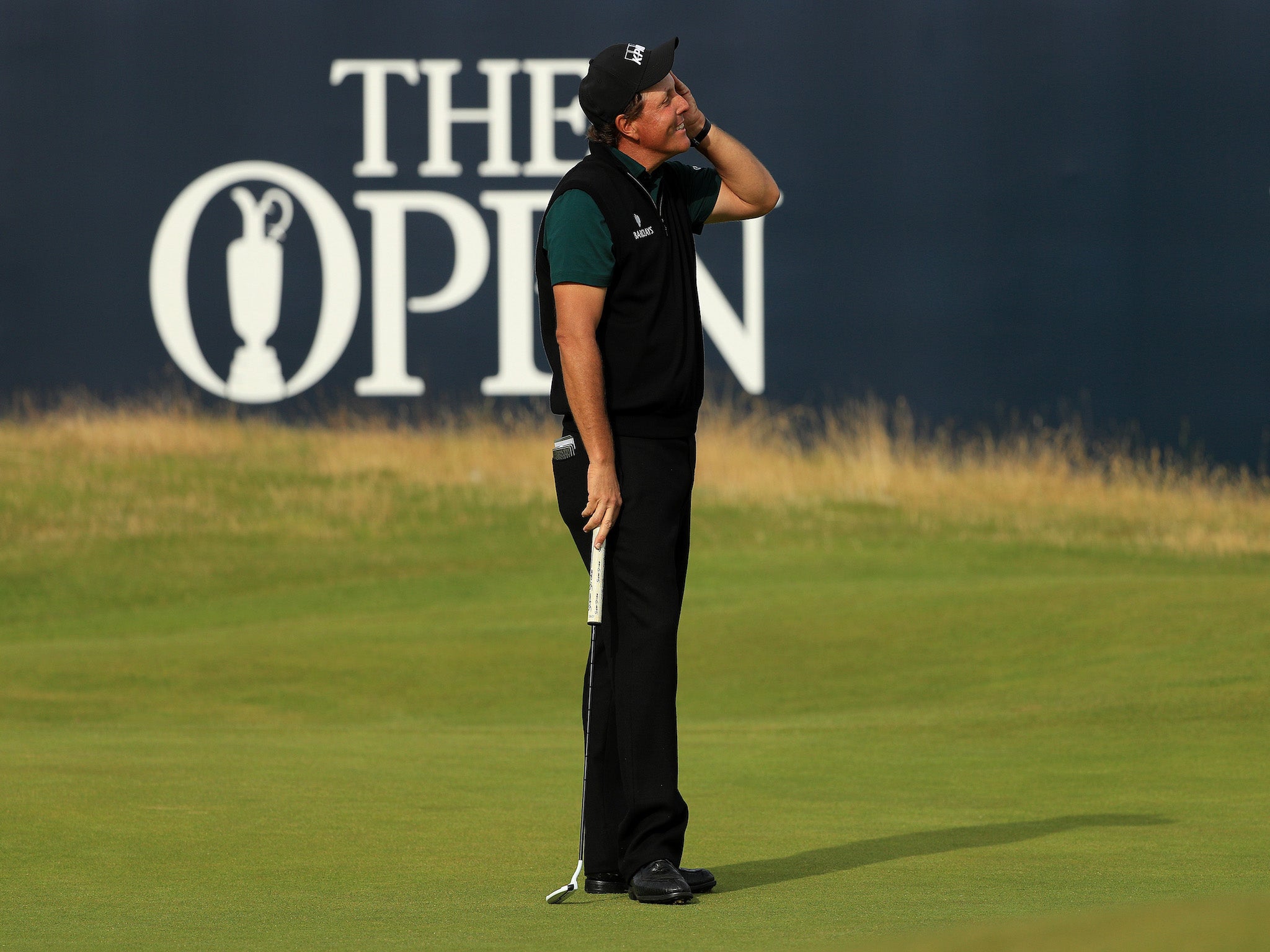 Phil Mickelson recoils in horror after watching his moment pass
