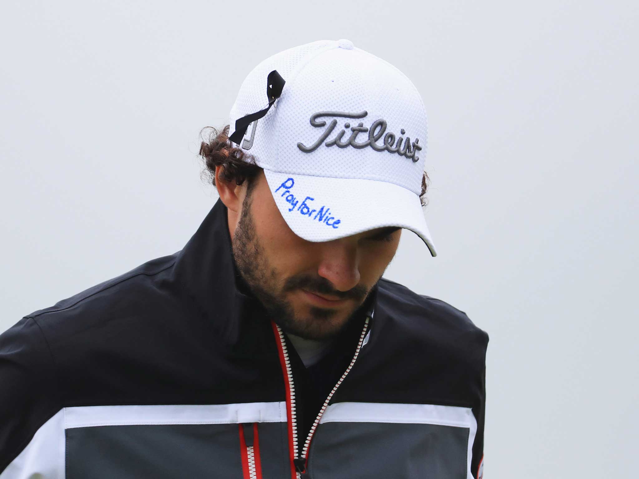 France's Clement Sorbet reveals his cap at the Open which reads: 'Pray for Nice'