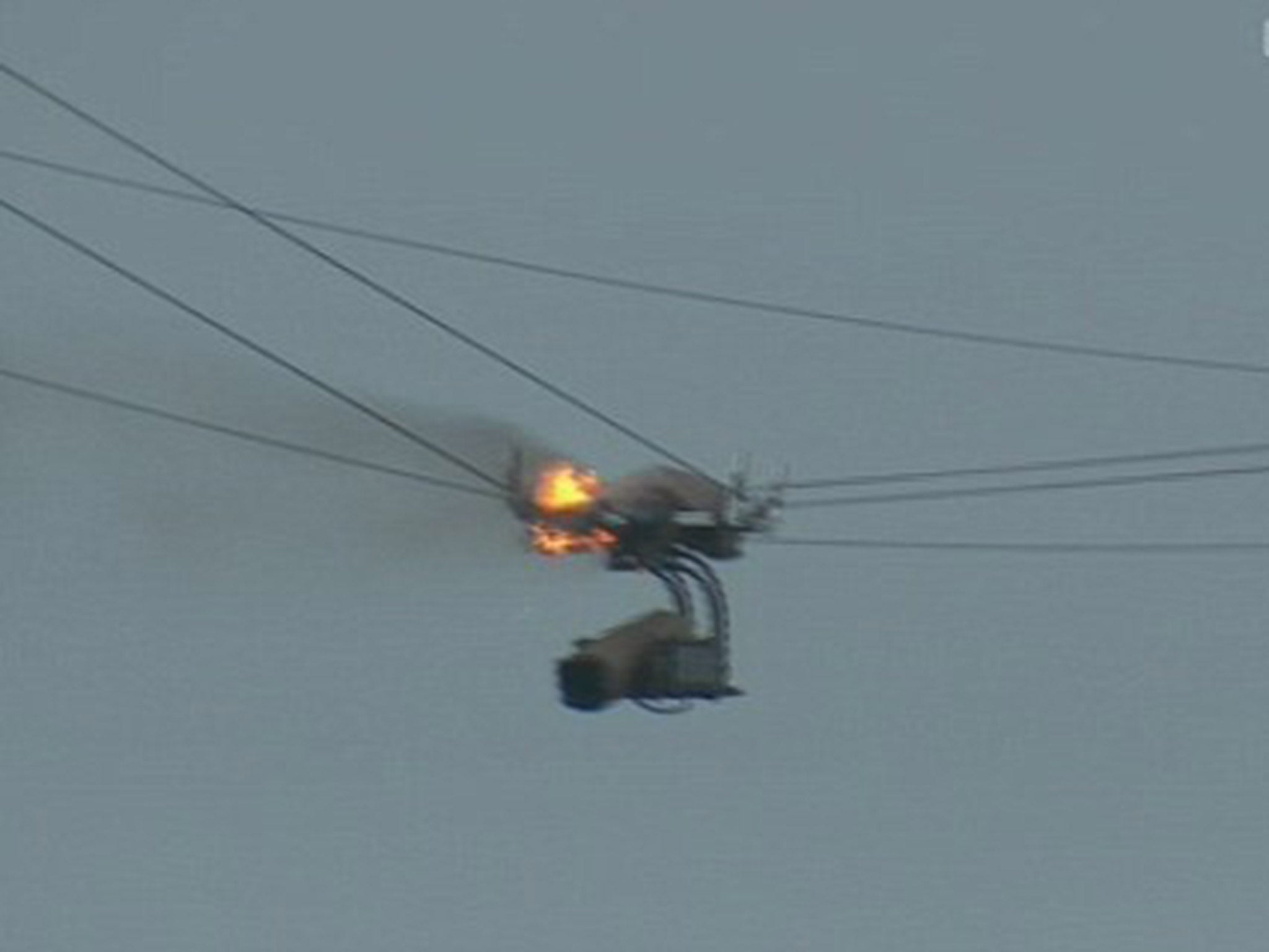The Sky Sports cable camera catches fire above the Royal Troon Golf Course during The Open