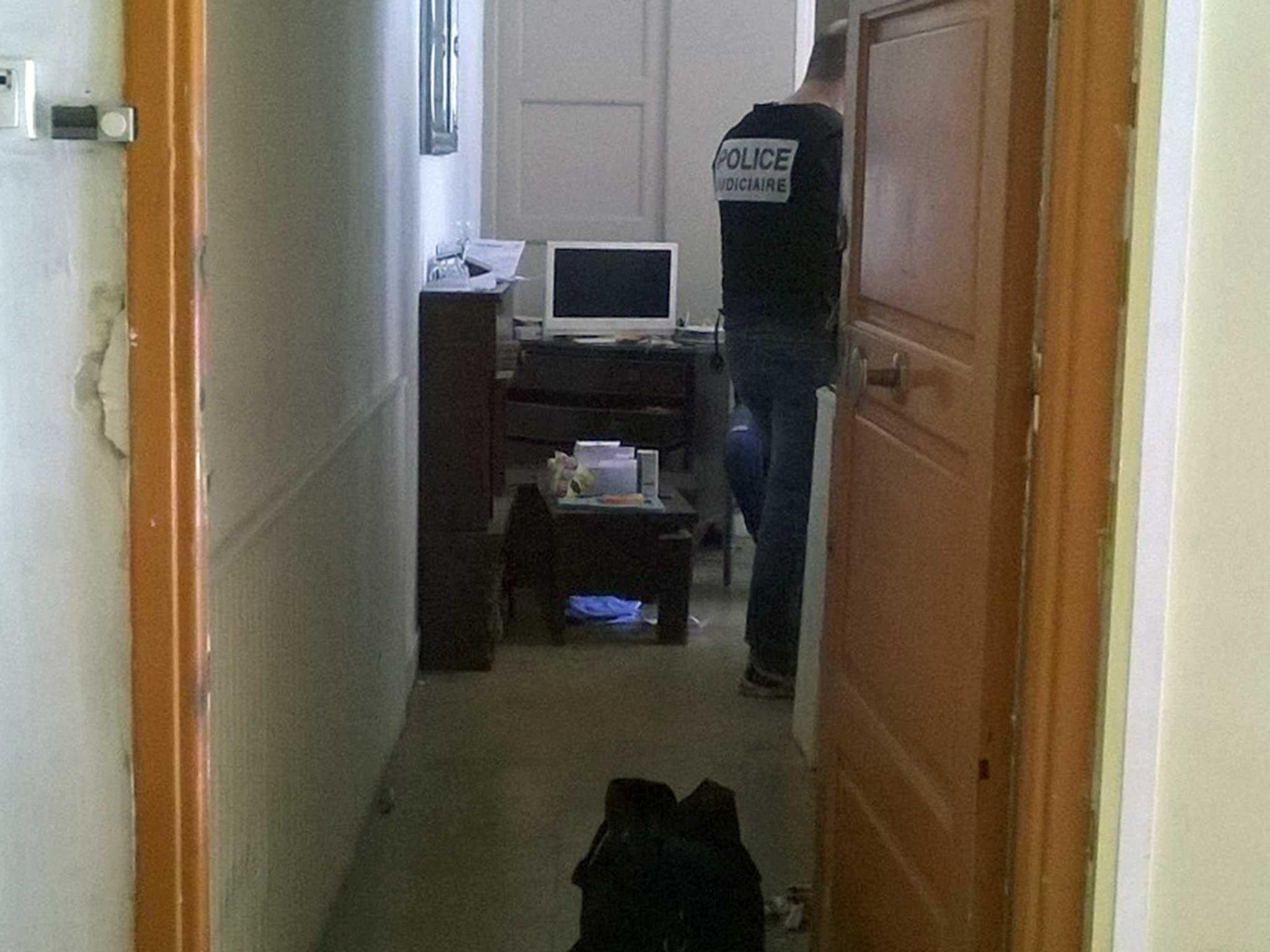 French police officers look for evidences in the flat of Mohamed Lahouaiej Bouhlel